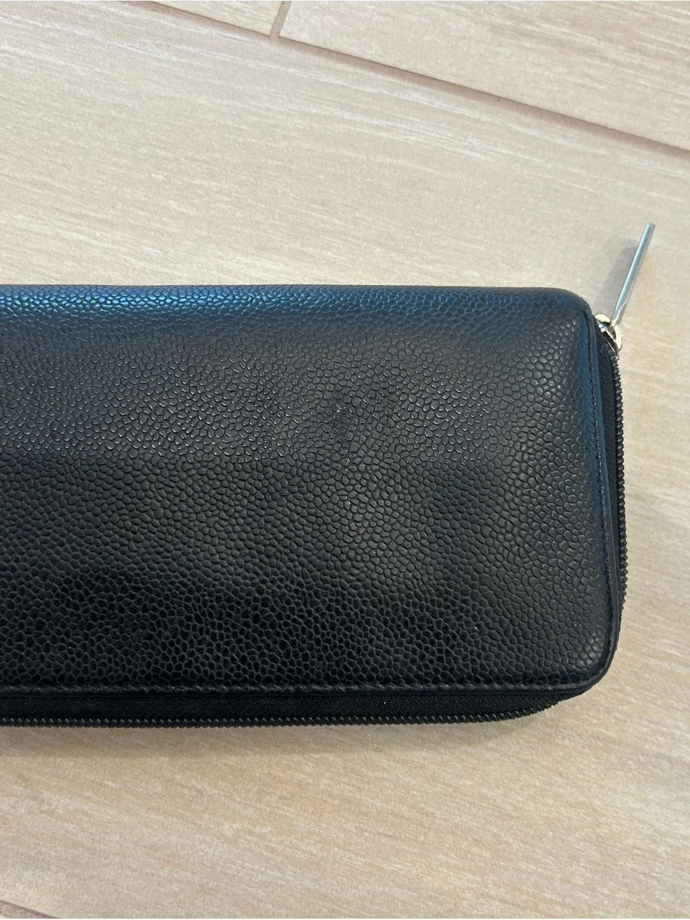 CHANEL Black Quilted Zip Around Wallet with Embossed CC